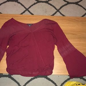 Maroon long sleeve with bell sleeves and cut outs